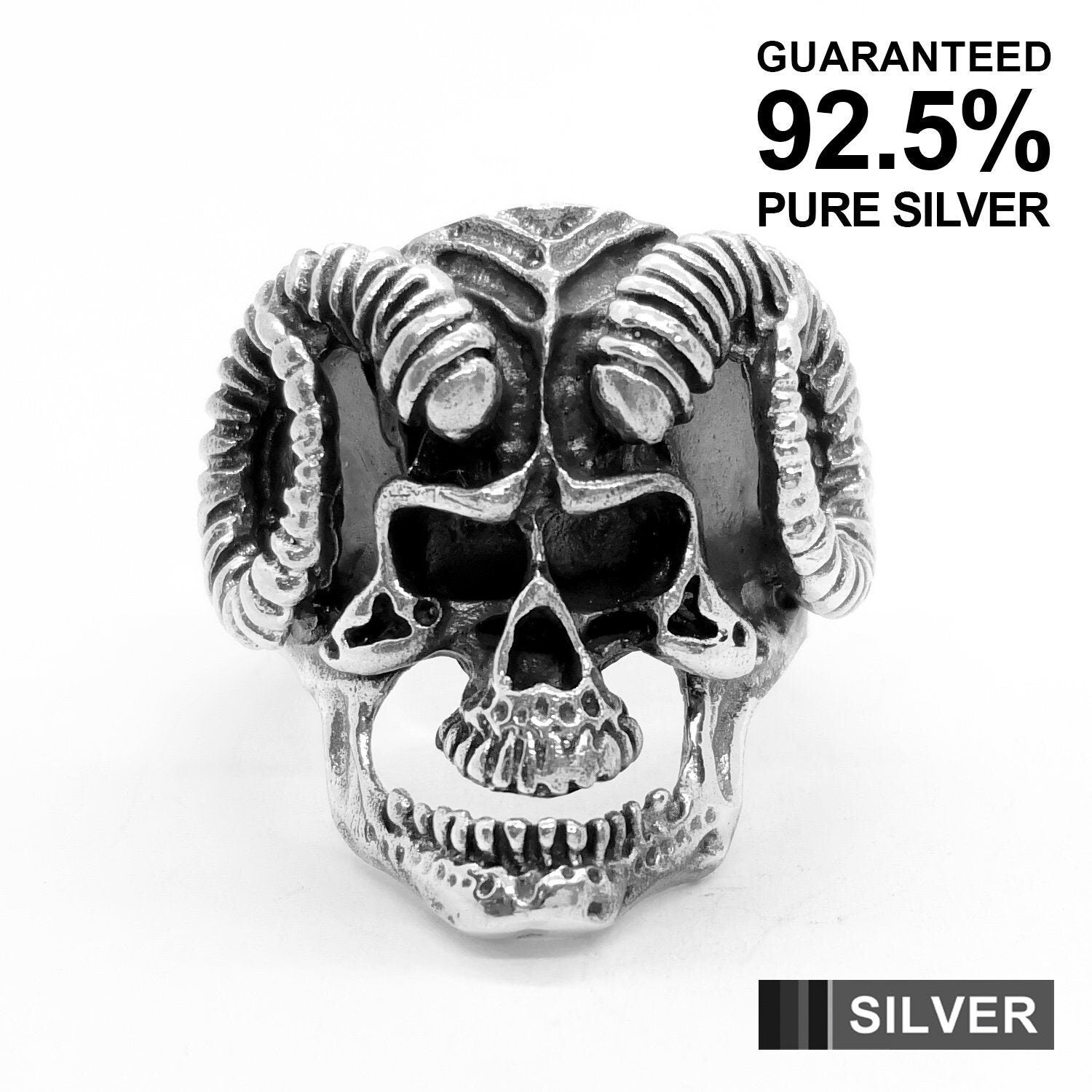 Solid silver skull on sale ring